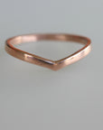A simple gold v-shaped ring