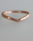 A simple gold v-shaped ring