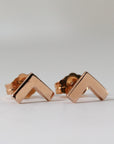 Rose gold chevron shaped earrings with a post and butterfly back
