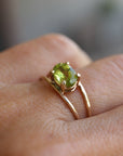 Model wearing 14k Gold Double Band Peridot Ring