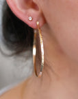 Earrings on the ear.