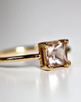 Morganite Engagement Ring 14k Gold. Princess Cut Morganite Ring. A gold ring with a square-shaped, light pink gemstone