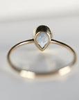Bezel Set Pear Cut Aquamarine Ring in 14k Gold