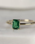A gold ring with a green emerald gemstone in a rectangular shape. Emerald Ring 14k Gold, Emerald Cut Emerald Engagement Ring Handmade, Minimalist Modern Gemstone Ring, 20th Anniversary Ring, May Birthstone
