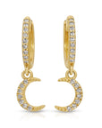 14k gold crescent moon earrings with pave diamonds hanging from small huggie hoops, shown on a white background in a flat lay style.