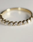 Floating Diamond Wedding Ring. It is Shared Prong Eternity Ring which is Stackable.