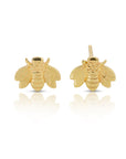 A pair of gold bee stud earrings. The bees are detailed with textured wings and bodies.