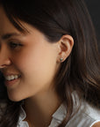 Model wearing 14k Gold Mushroom Stud Earrings