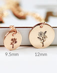 Two gold necklaces with delicate flower charms. The smaller charm is 9.5 mm in diameter and the larger charm is 12 mm in diameter.