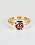 Cushion cut Rose de France amethyst solitaire ring in 10k gold with a bezel setting, displayed on a white background as elegant handmade ring.