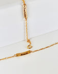 Custom gold filled bar bracelet with a child’s name engraved, shown on a white background. Dainty and personalized baby jewelry.