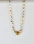 Tiny Bow Necklace 14k Solid Gold with Dainty Twisted Ribbon Charm - Melt'm Jewelry