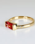 Baguette Cut Pink Tourmaline Ring in 14k gold with flush set diamond band