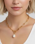 Model wearing baroque pearl toggle necklace with gold filled paperclip chain, modern bridal jewelry