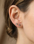 Model wearing, Natural Rose Cut Grey Diamond Stud Earrings Minimalist Everyday Jewelry.