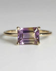 Minimalist emerald cut ametrine gemstone ring. Handmade purple and yellow stone ring, perfect for non-traditional engagement or anniversary jewelry.