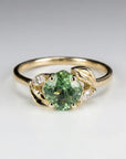 14k solid gold prasiolite cushion cut engagement ring with marquise diamond accent and leaf decorated nature inspired design