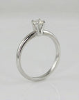 Natural 0.25ct brilliant cut diamond ring in 14k white gold with cathedral setting on finger, minimalist engagement ring