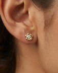 14k solid gold flower flat back earring worn in cartilage piercing, minimalist CZ gold ear stack stud