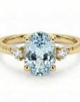 oval aquamarine engagement ring in 14k gold with two diamond accents march birthstone ring