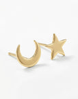 Close-up of 14k solid gold crescent moon and star stud earrings, minimalist celestial jewelry inspired by Sailor Moon