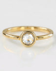 Rose cut diamond ring in 14k gold with hammered textured band and bezel setting