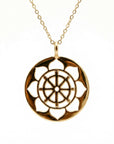 Minimalist 14k solid gold chakra medallion necklace inspired by the heart chakra symbol