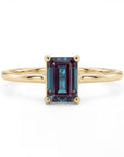 Handmade 14k gold emerald cut alexandrite engagement ring, featuring the June birthstone, perfect for anniversaries and birthday gifts