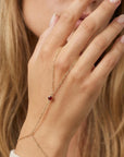 Gold slave bracelet with round garnet gemstone hand chain bracelet connected to ring, minimalist hand jewelry