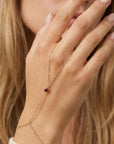 Gold slave bracelet with round garnet gemstone hand chain bracelet connected to ring, minimalist hand jewelry
