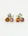 colorful gemstone cluster earrings with pink tourmaline floral design close up detail