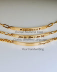 Three gold bar bracelets displaying examples of custom engraving including Roman numerals, gothic text, and handwriting.