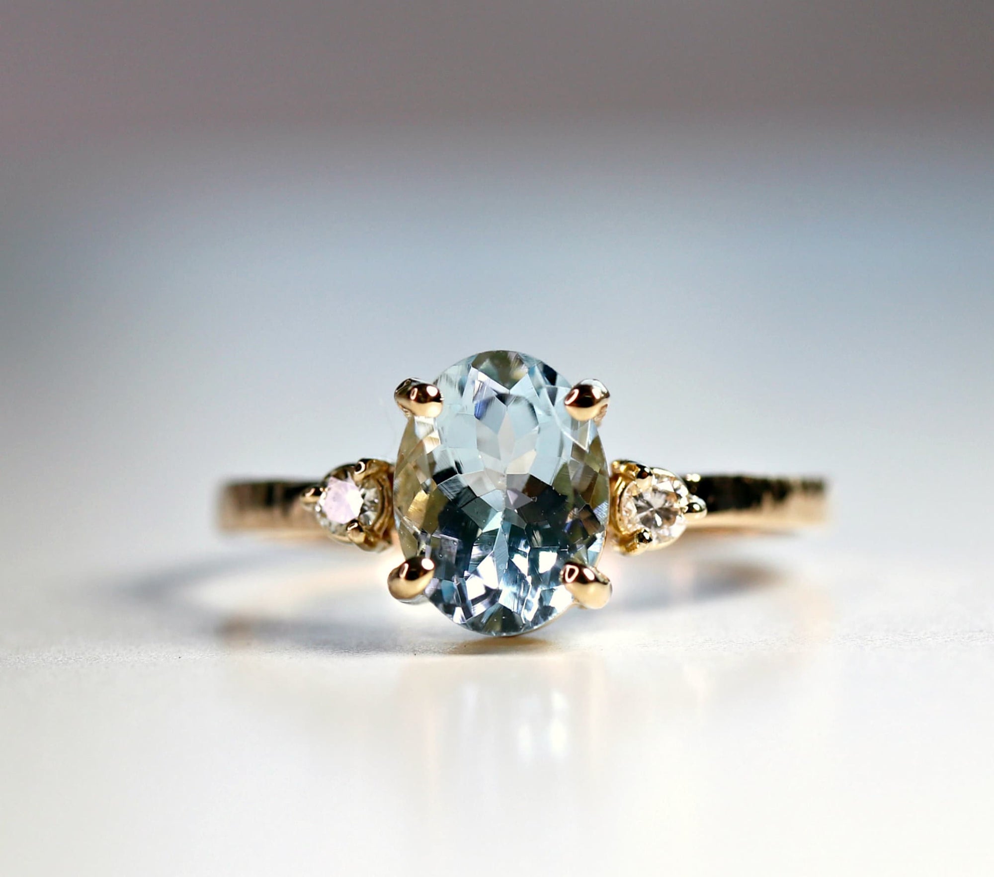 Oval Aquamarine Engagement Ring with two Accent Diamonds