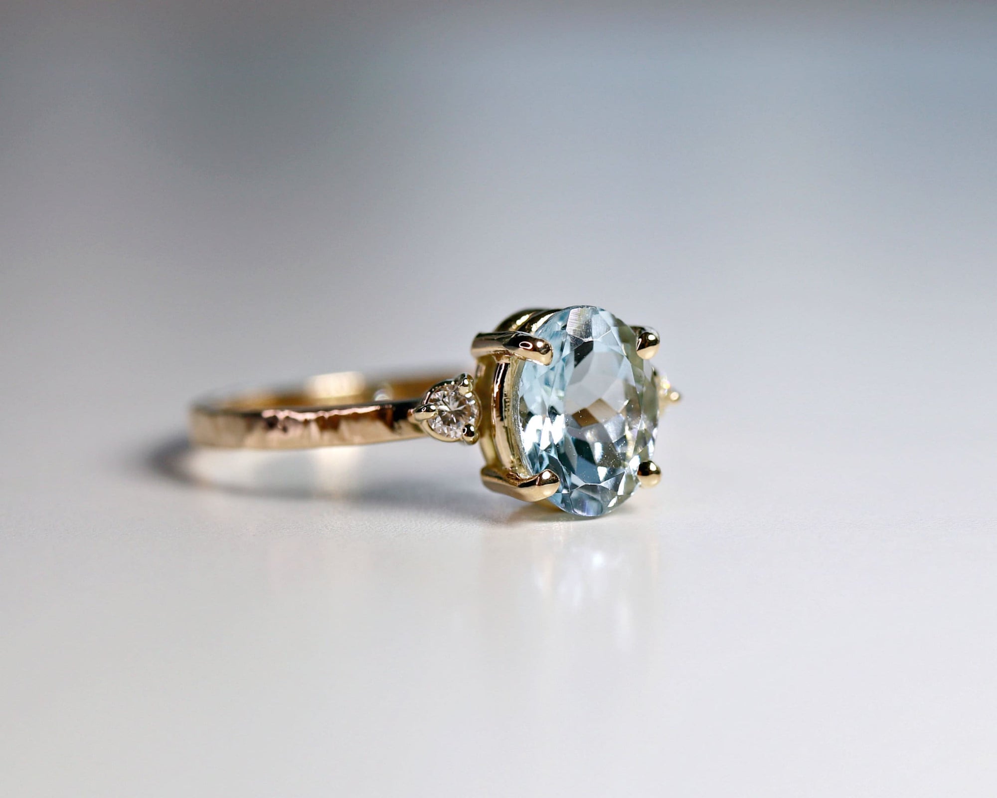 Oval Aquamarine Engagement Ring with two Accent Diamonds