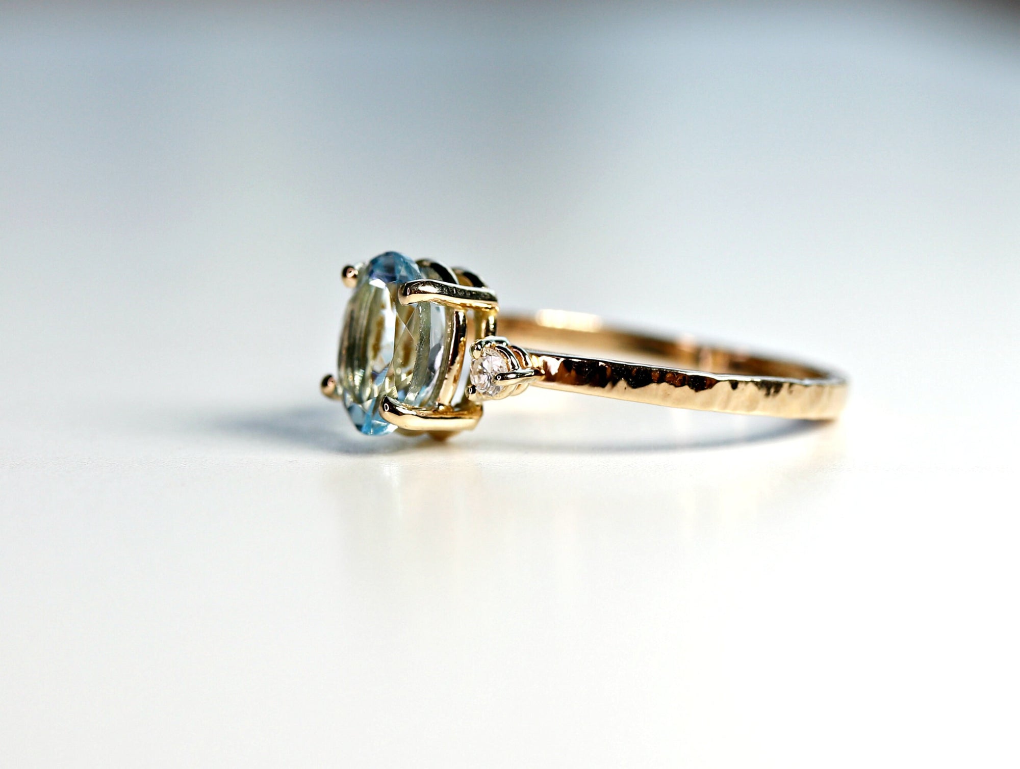 Oval Aquamarine Engagement Ring with two Accent Diamonds