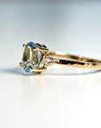 Oval Aquamarine Engagement Ring with two Accent Diamonds