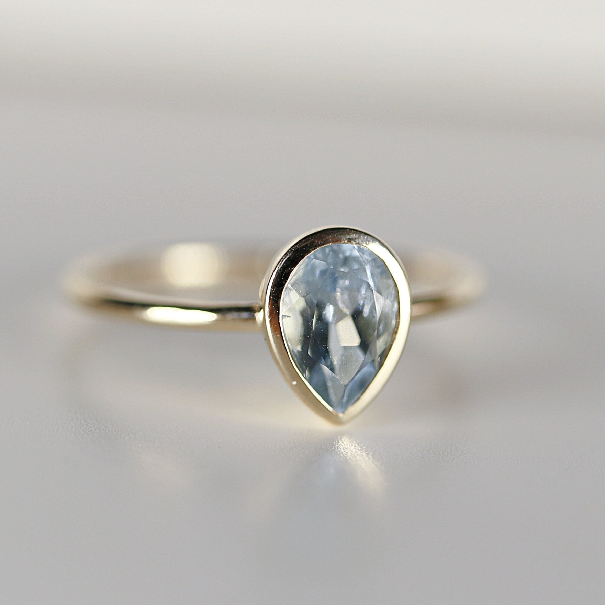 Bezel Set Pear Cut Aquamarine Ring in 14k Gold - Melt'm Jewelry