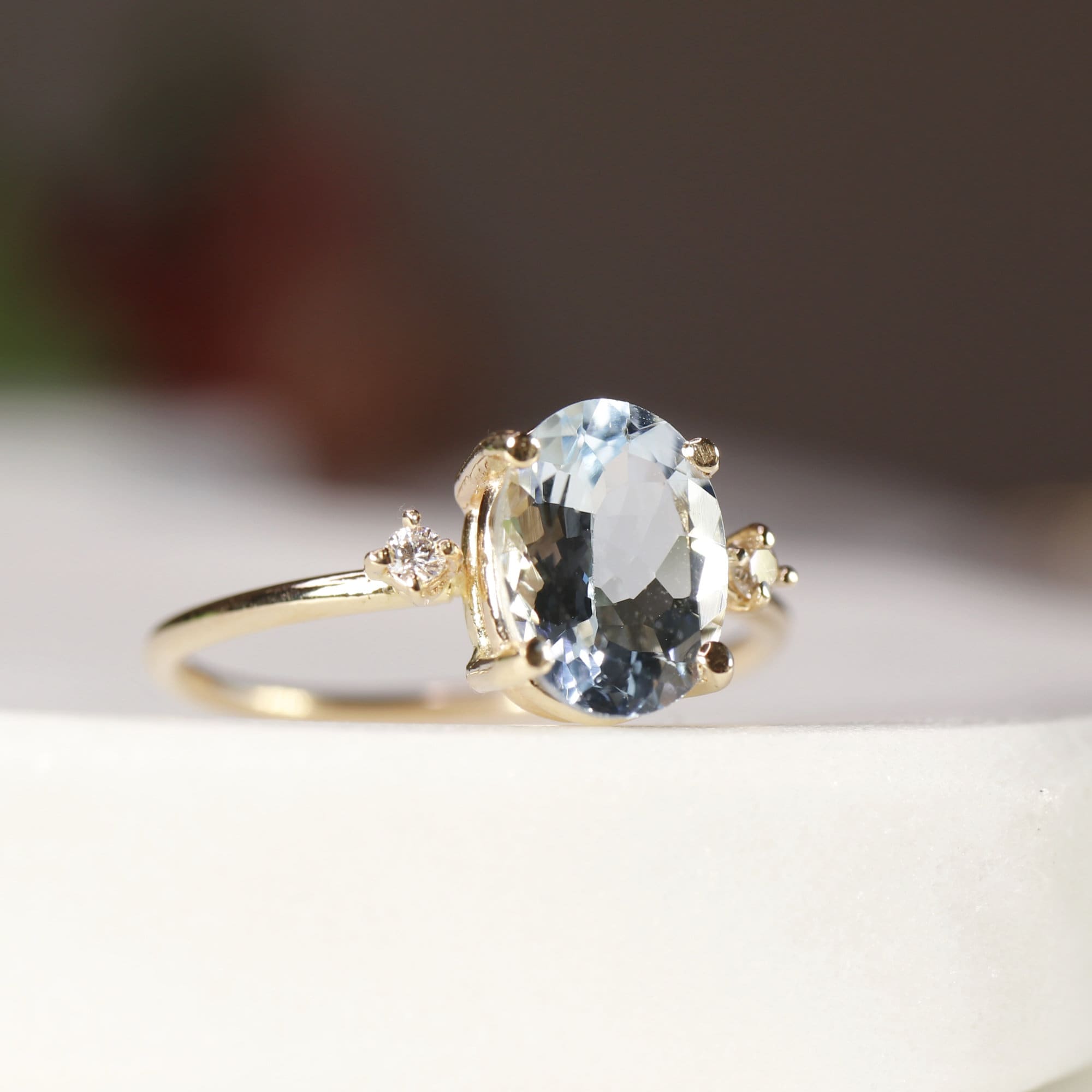 Oval Aquamarine Engagement Ring with two Accent Diamonds