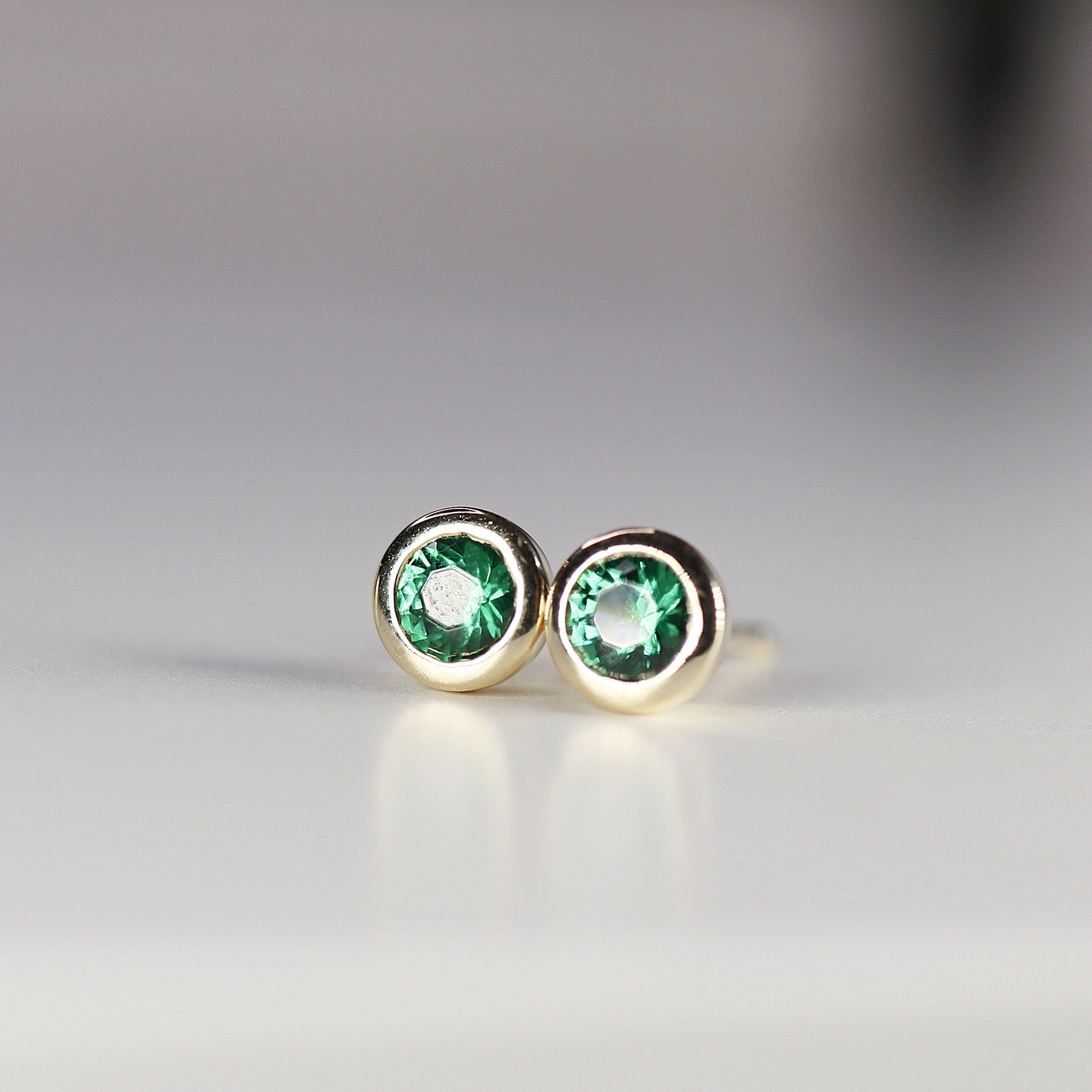 14k Gold Bezel Set Emerald Stud Earrings