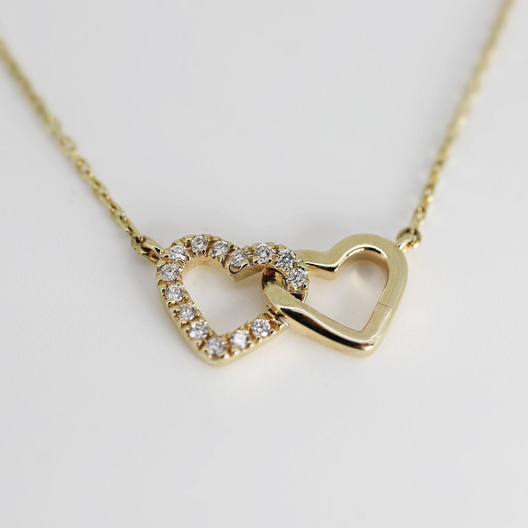 14k Gold Diamond Interlocking Two Hearts Necklace