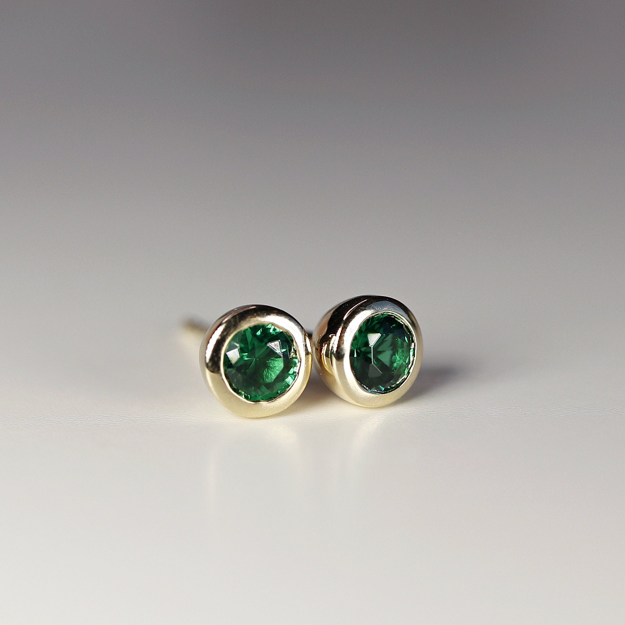 14k Gold Bezel Set Emerald Stud Earrings