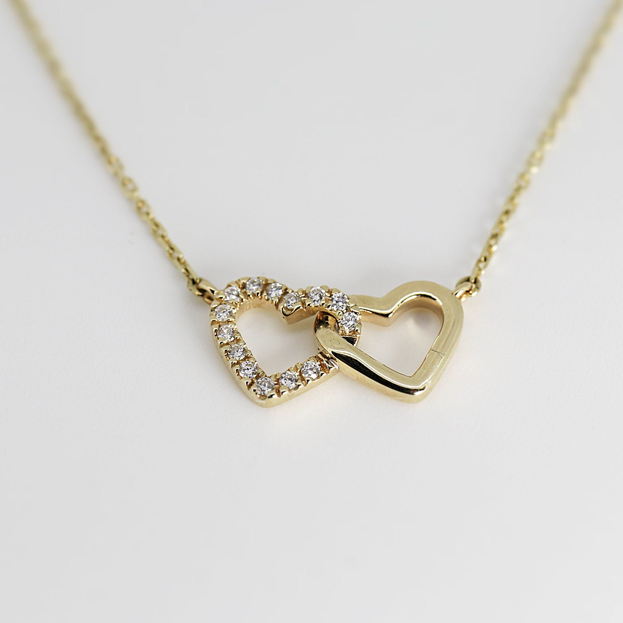 14k Gold Diamond Interlocking Two Hearts Necklace