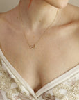 14k Gold Diamond Interlocking Two Hearts Necklace