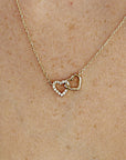 14k Gold Diamond Interlocking Two Hearts Necklace