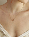 14k Gold Diamond Interlocking Two Hearts Necklace