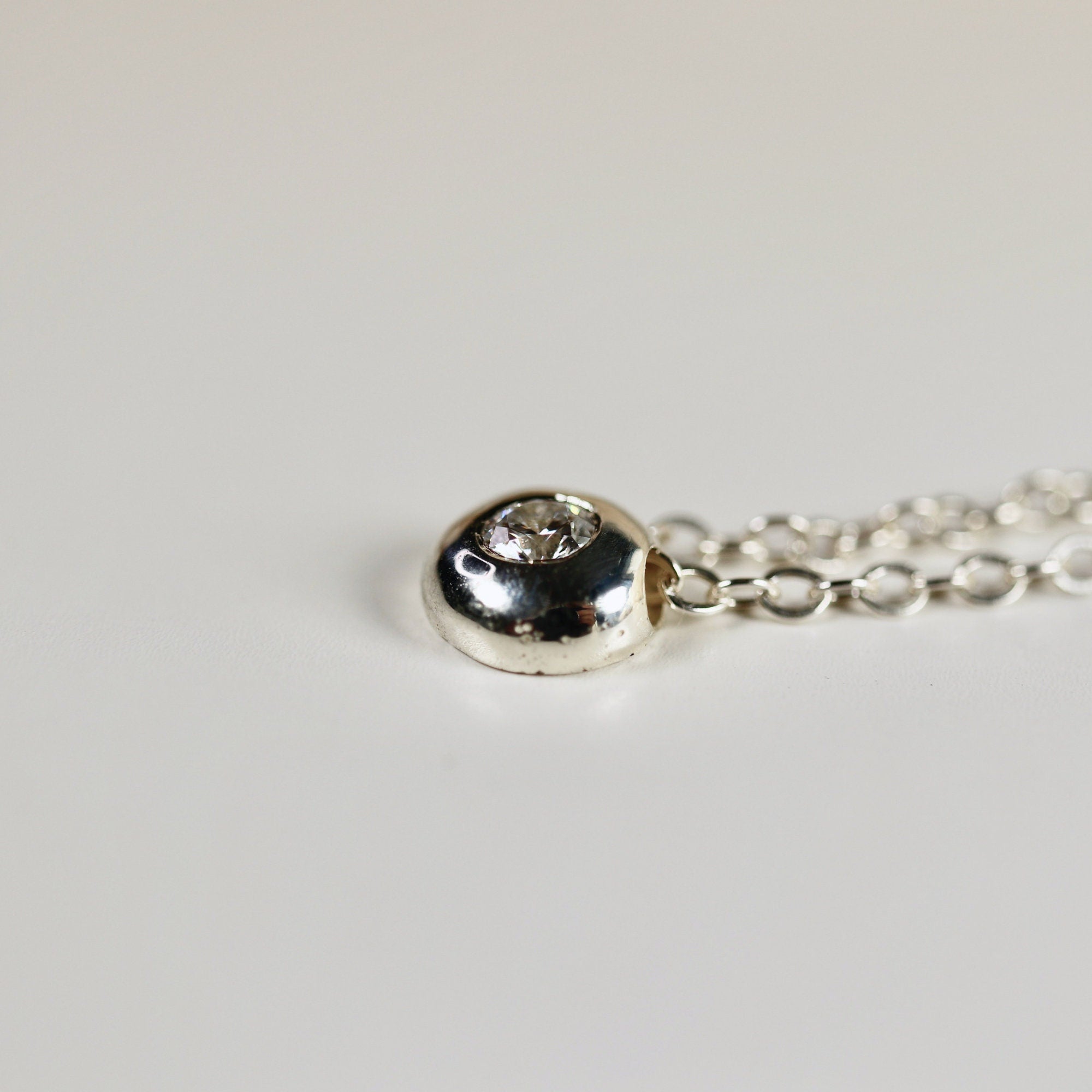 Sterling Silver Floating CZ Pebble Necklace - Melt'm Jewelry