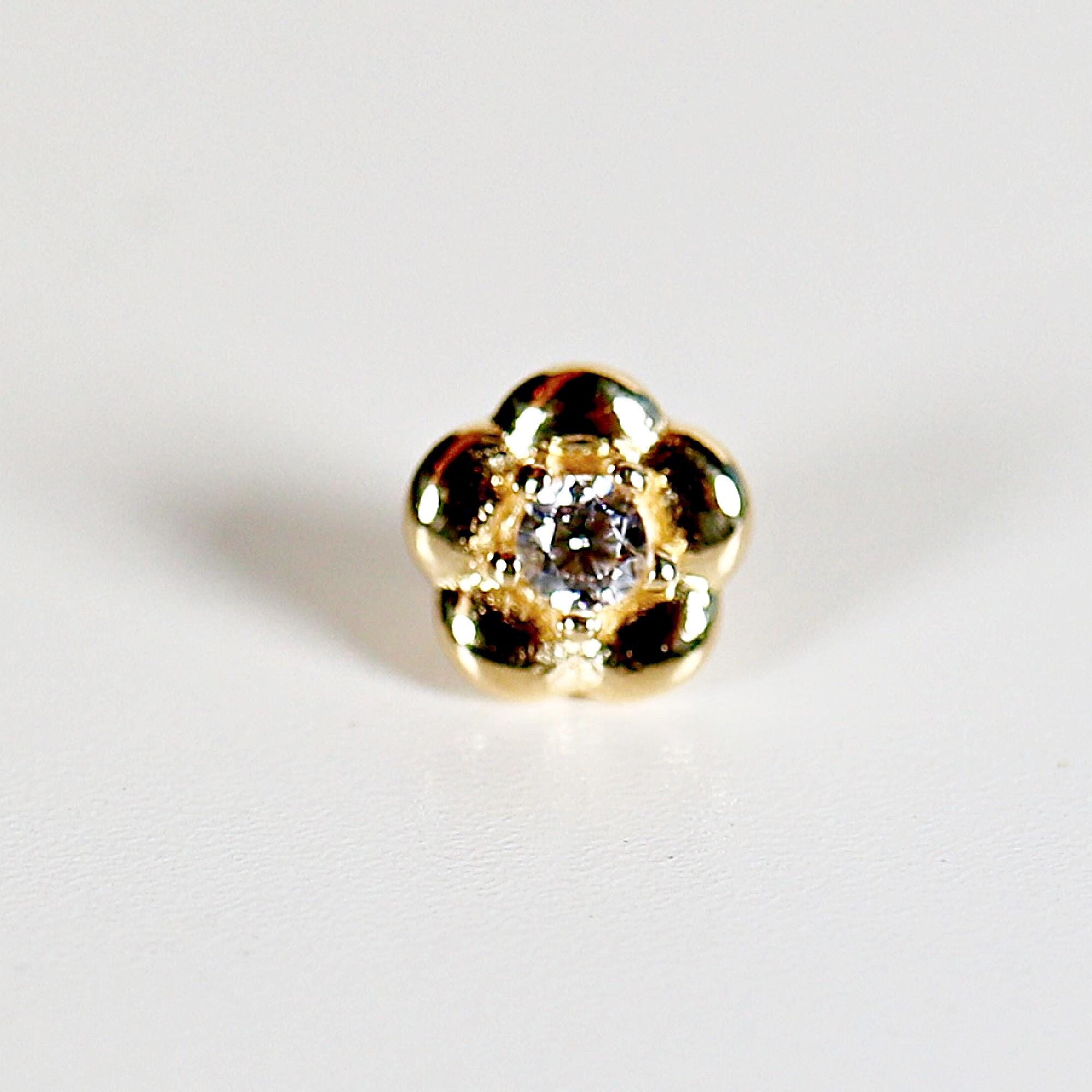 14k solid gold flat back flower earrings with CZ center, shown on a white background with internally threaded design
