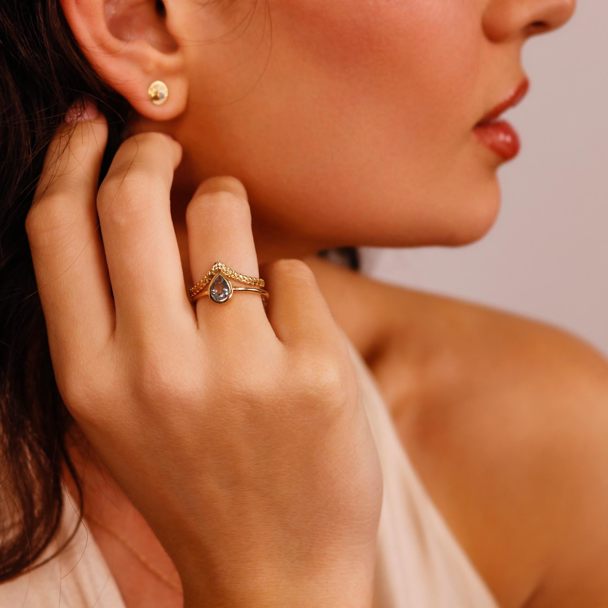 Bezel Set Pear Cut Aquamarine Ring in 14k Gold