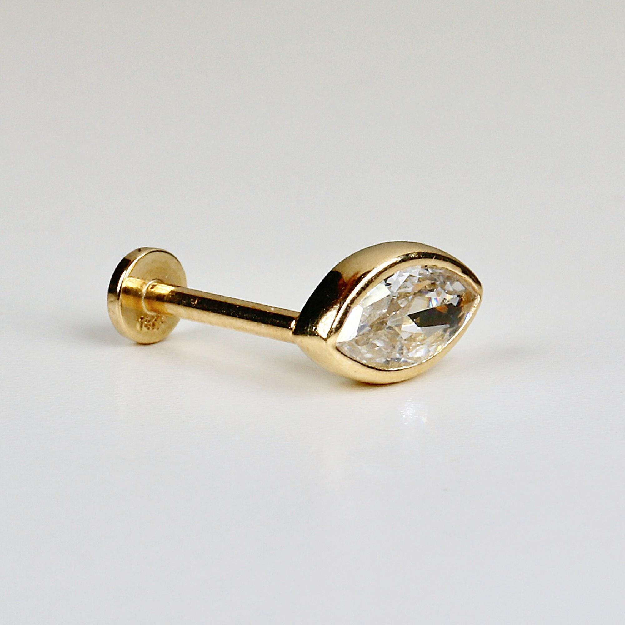 Marquise CZ bezel stud earrings in 14k solid gold with flat back and internally threaded post, displayed on a white background.