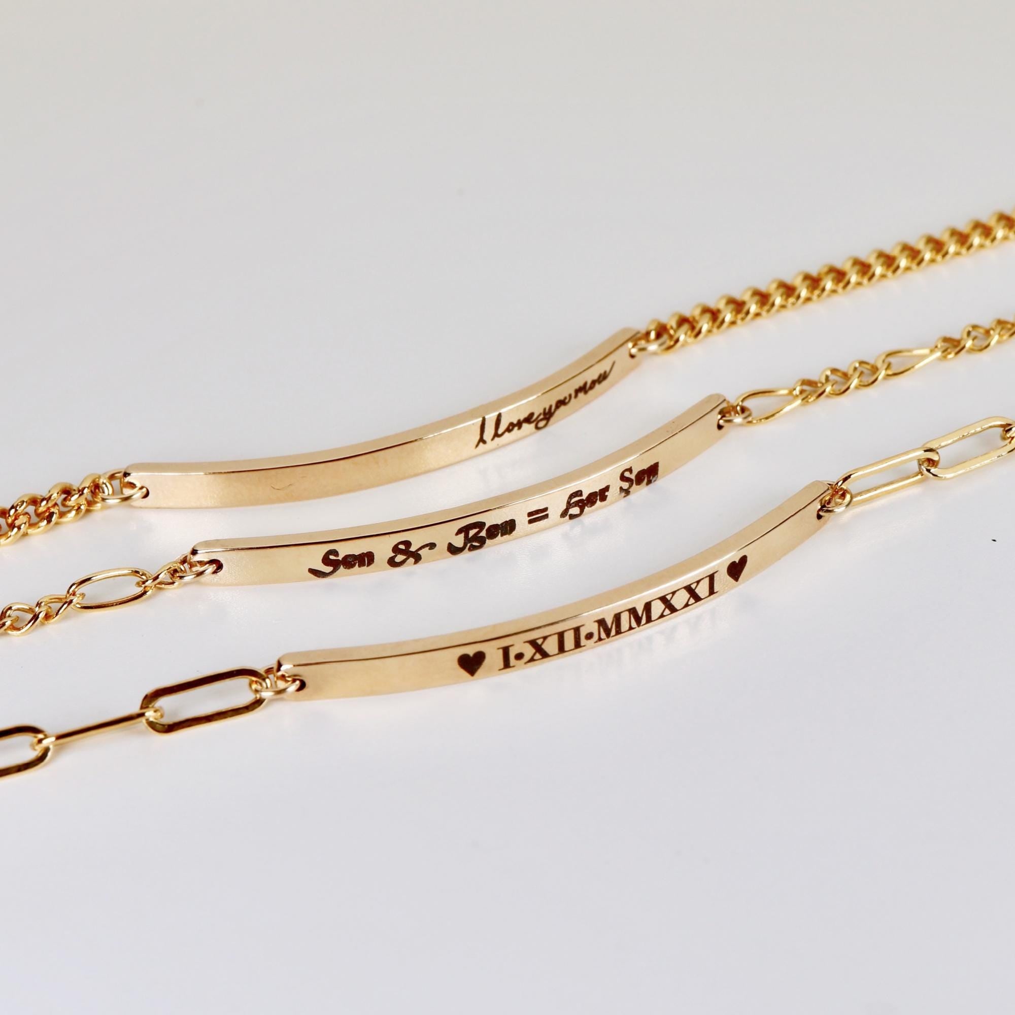 Gold filled personalized bar bracelet with custom engraving, dainty nameplate bracelet styled on a neutral background, minimalist gift for her